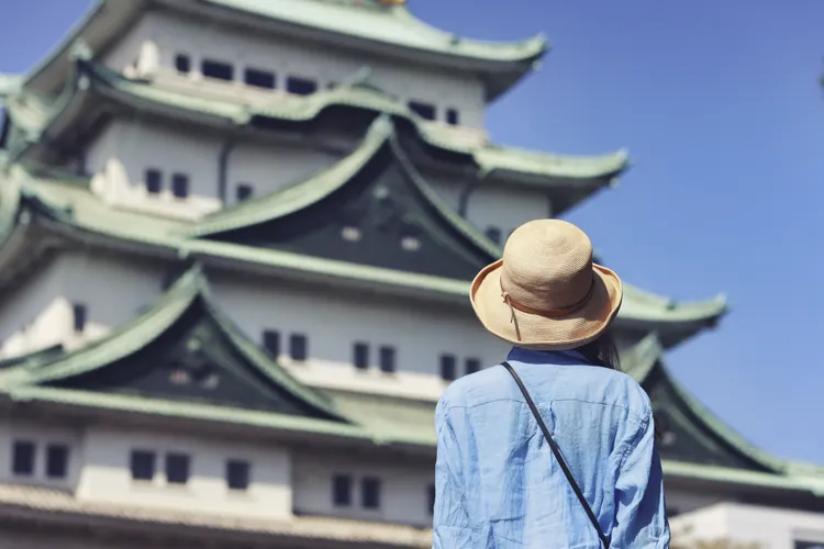 Woman gazing at Nagoya Castle