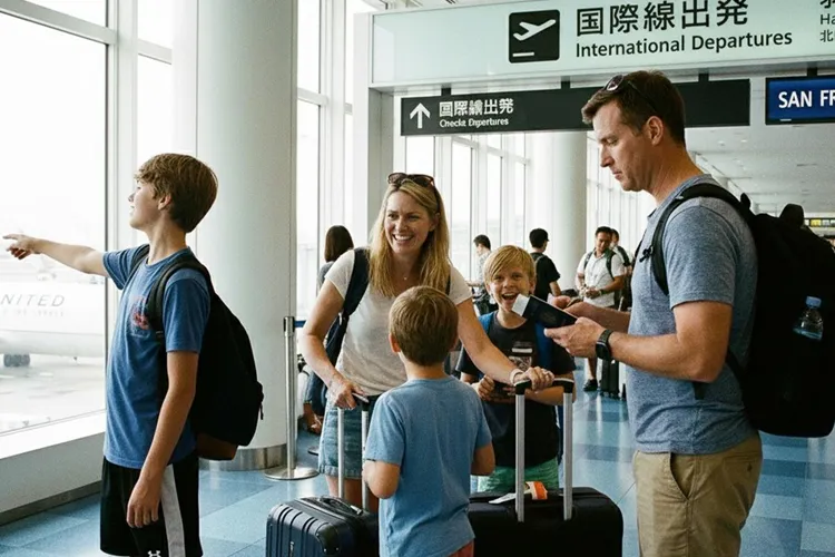 A family arriving at Haneda Airport