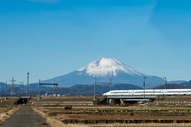 Bullet train passing Mount Fuji on the route between Tokyo and Kyoto