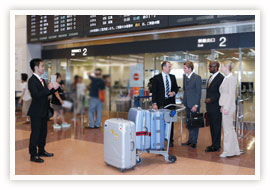 The staff will be waiting in the arrival lobby
